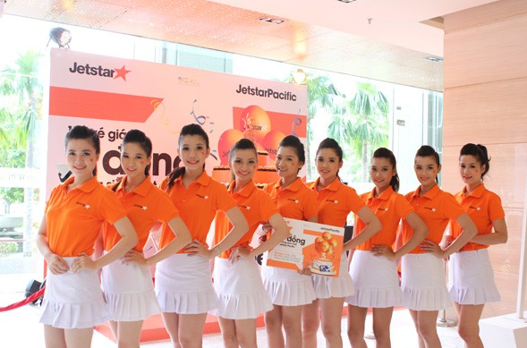 May đồng phục màu cam